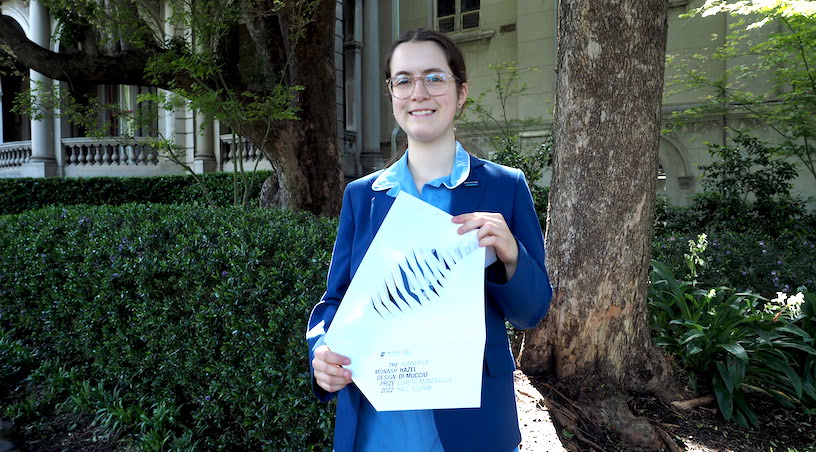 Hazel (Year 10) holding up her certificate from Monash Design Prize